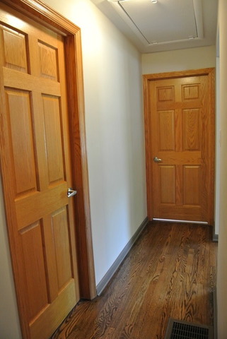 10549 Oak Park Avenue Chicago Ridge, IL 60415 - Photo 18 of 25 an empty room with wooden floor and closet