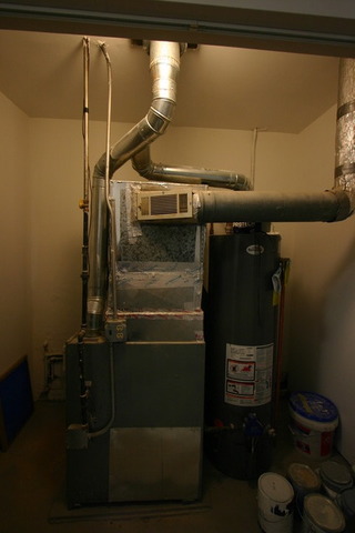 10549 Oak Park Avenue Chicago Ridge, IL 60415 - Photo 23 of 25 a close view of water heater