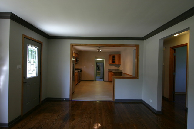 10549 Oak Park Avenue Chicago Ridge, IL 60415 - Photo 8 of 25 a view of a hallway view with wooden floor and living room