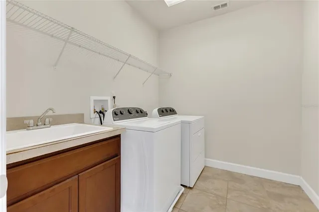 a view of a big room with a big yard and potted plants