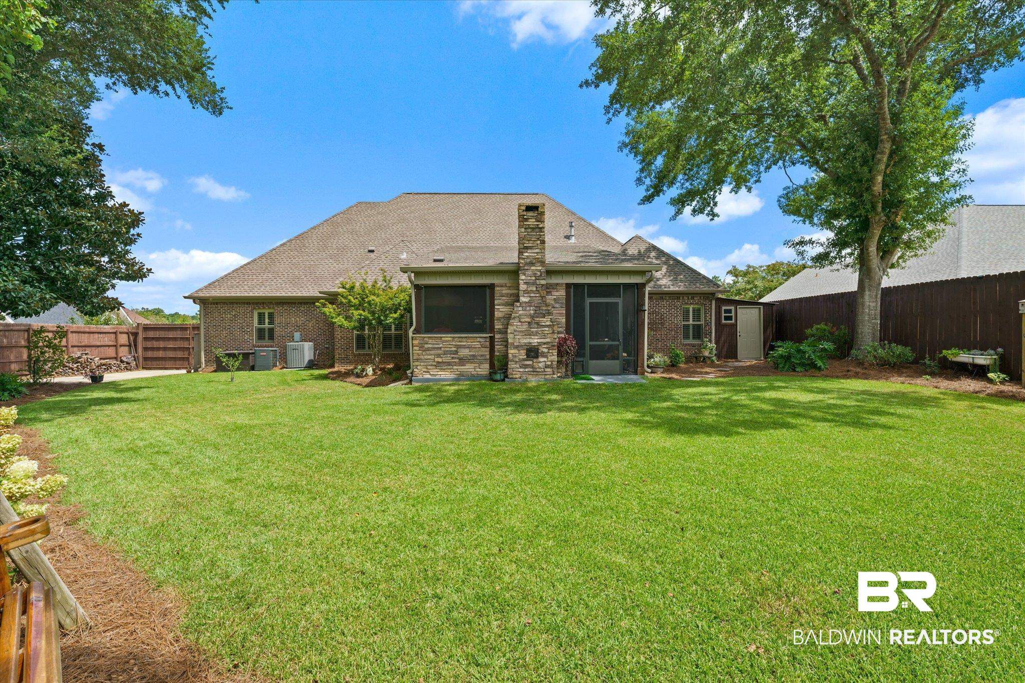 5683 Spring Landing Drive Theodore, AL 36582 - Photo 44 of 49 Back of property with a lawn