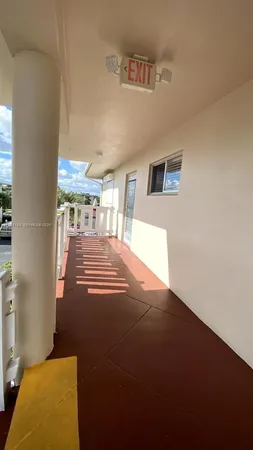 a view of a livingroom with furniture