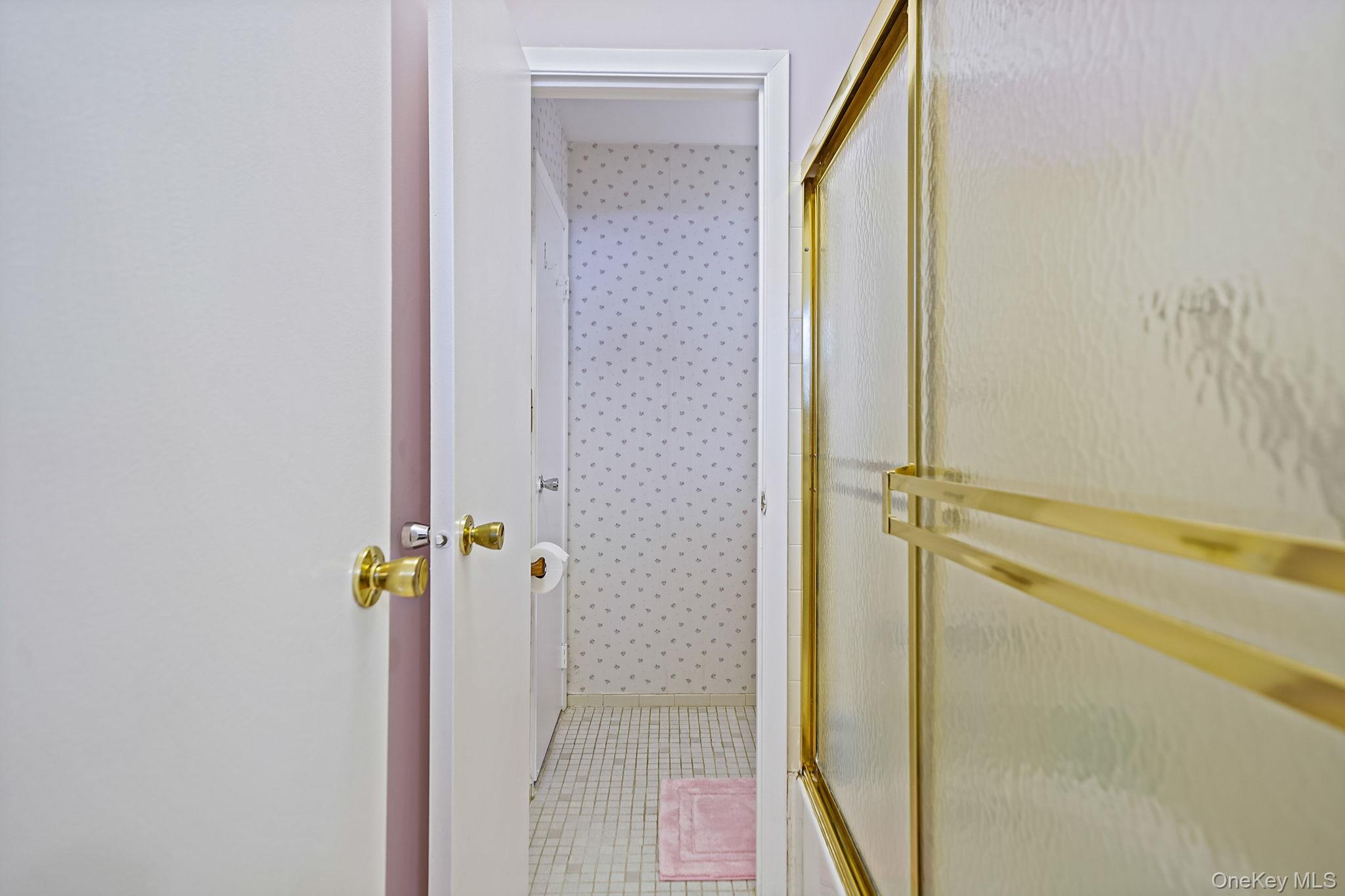 8 Huntington Commons, Unit 8 Yaphank, NY 11980 - Photo 19 of 30 a bathroom with a shower