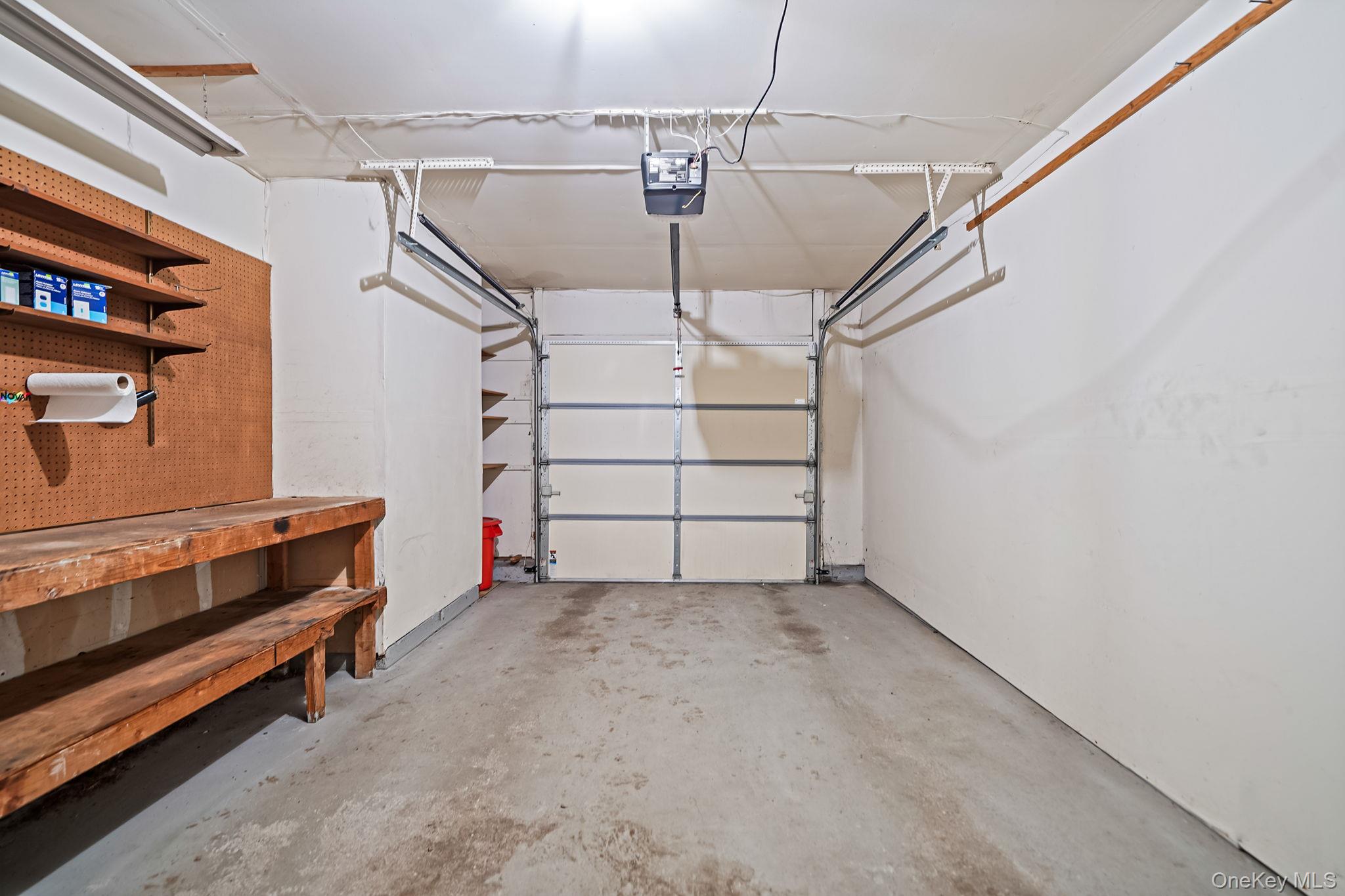 8 Huntington Commons, Unit 8 Yaphank, NY 11980 - Photo 27 of 30 a view of a room with racks