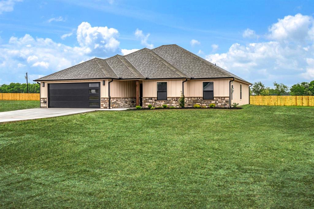 59 Private Road Brookston, TX 75421 - Photo 24 of 26 a front view of a house with a yard
