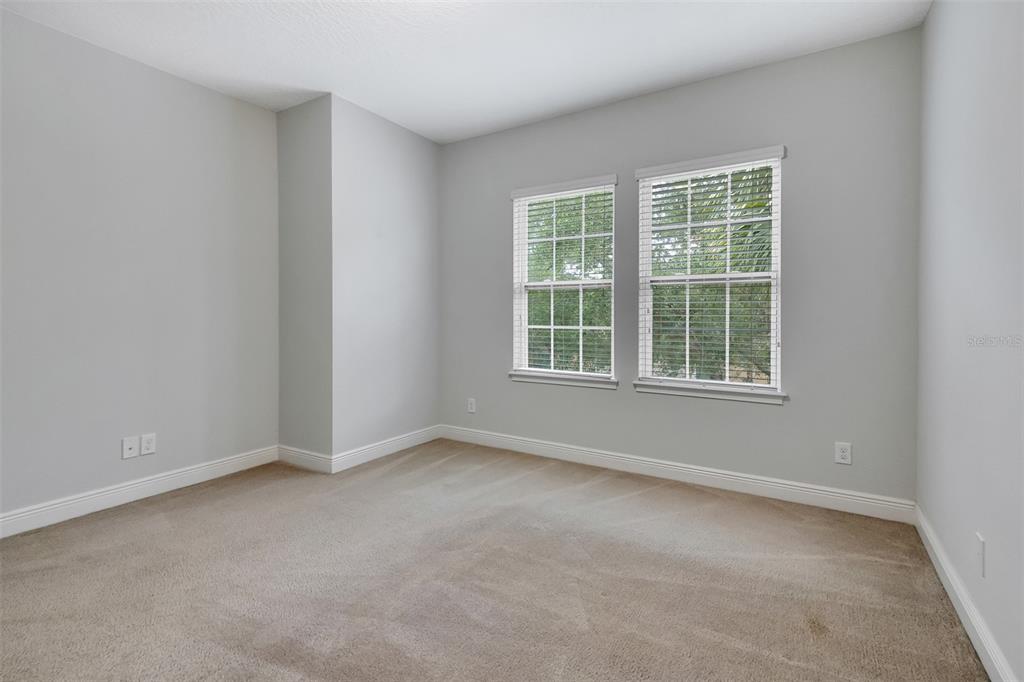 12357 Via Derna Place Windermere, FL 34786 - Photo 17 of 33 an empty room with a window