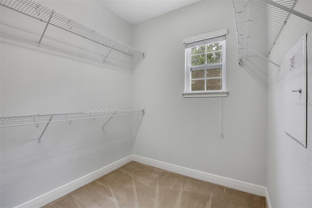 12357 Via Derna Place Windermere, FL 34786 - Photo 18 of 33 a view of a room with racks on the wall