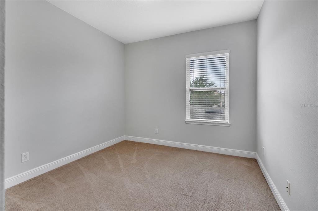 12357 Via Derna Place Windermere, FL 34786 - Photo 23 of 33 an empty room with a window