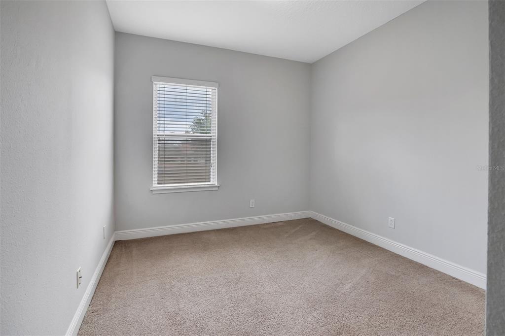 12357 Via Derna Place Windermere, FL 34786 - Photo 24 of 33 an empty room with a window