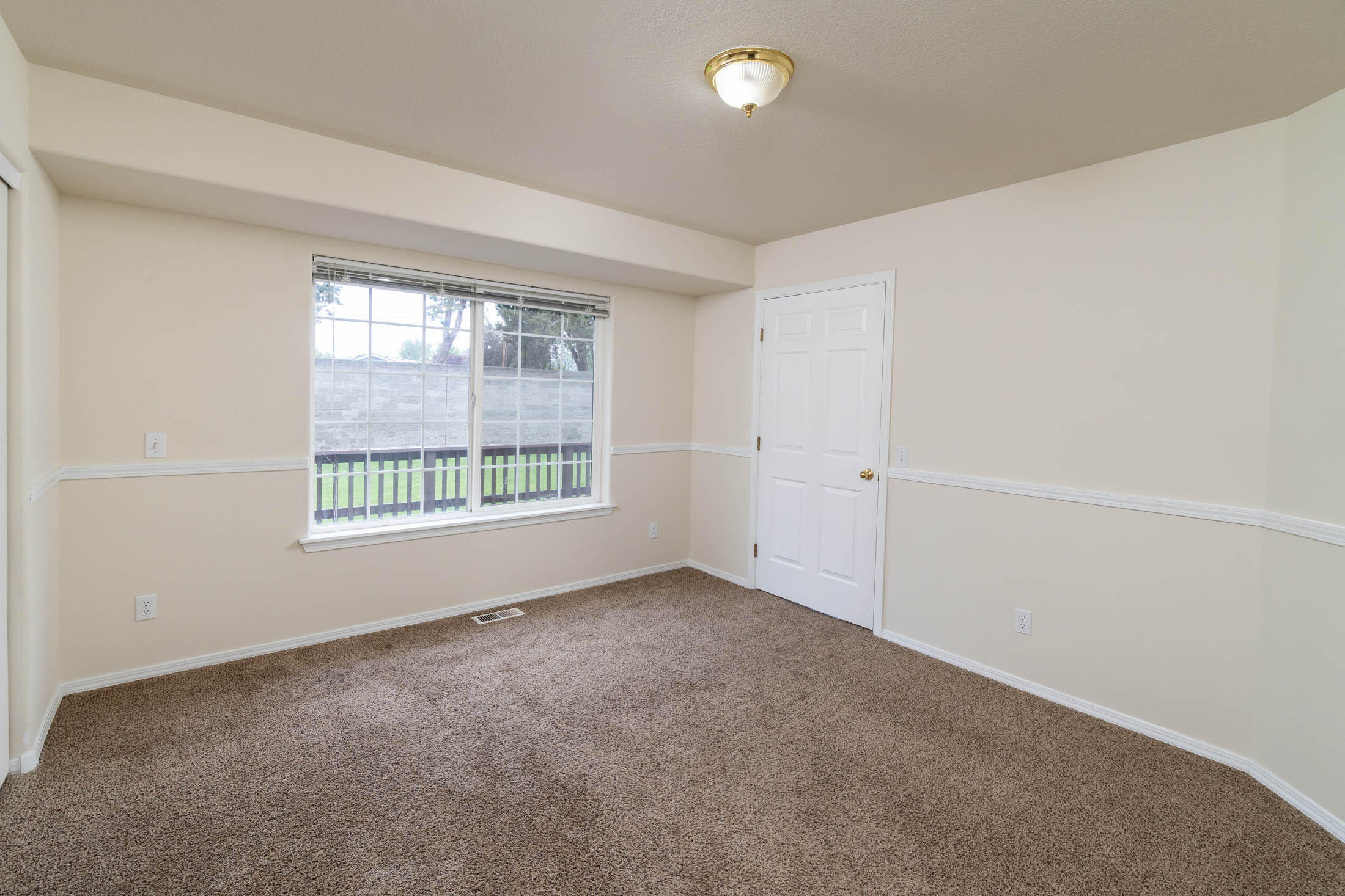 3389 Northeast Stonebrook Loop Bend, OR 97701 - Photo 11 of 27 3rd Bedroom or office area off the kitchen nook area.