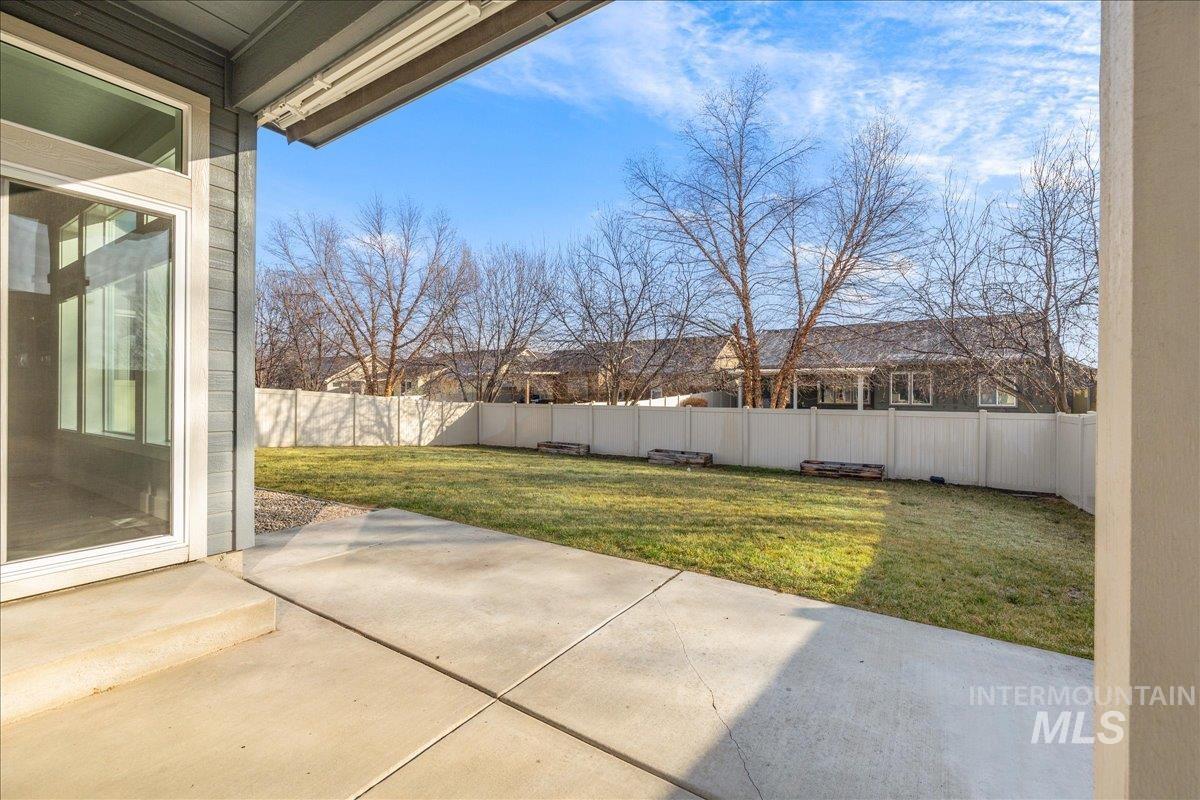 3036 Northwest 13th Street Meridian, ID 83646 - Photo 39 of 50 Fenced backyard featuring a patio area