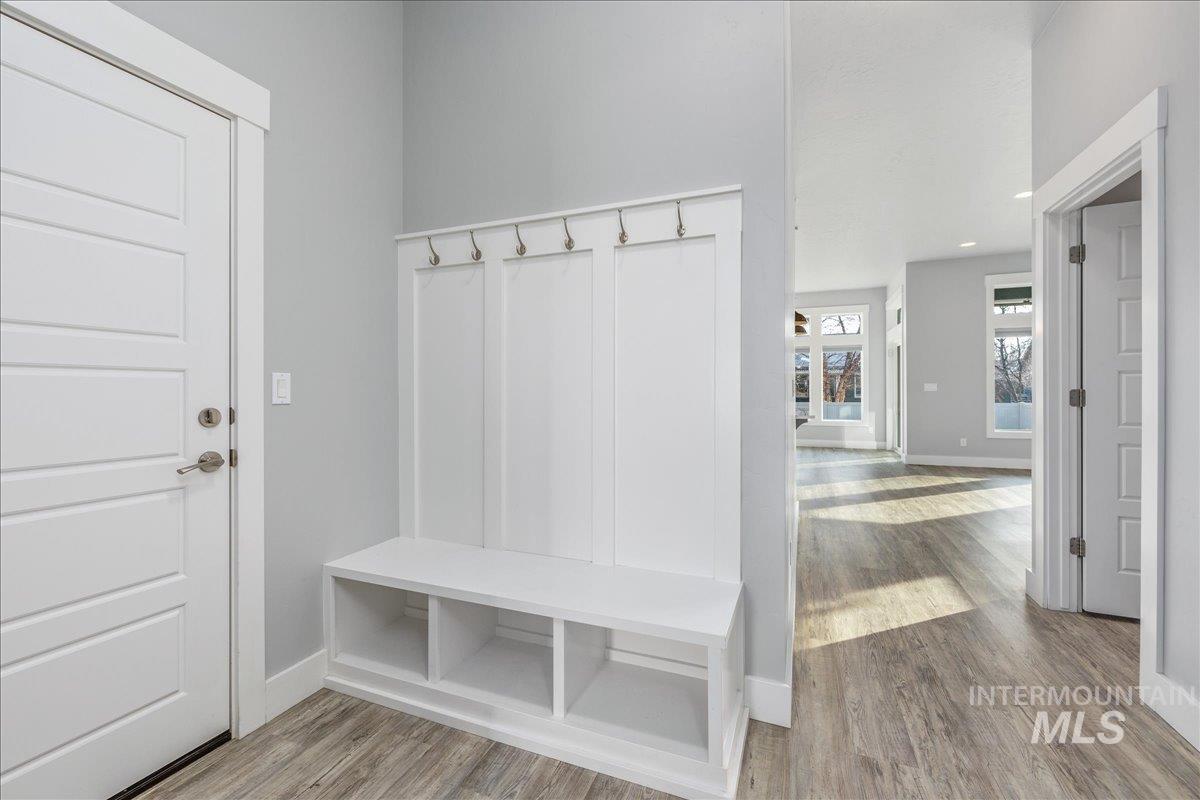 3036 Northwest 13th Street Meridian, ID 83646 - Photo 7 of 50 Mudroom featuring light wood finished floors and recessed lighting