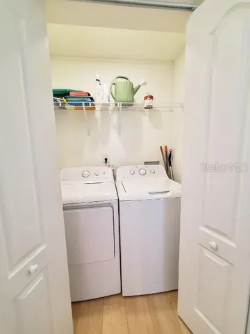 a utility room with dryer and washer