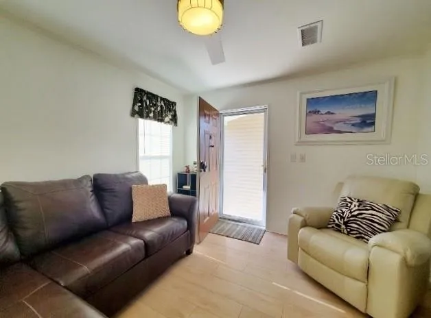 a living room with furniture and a couch