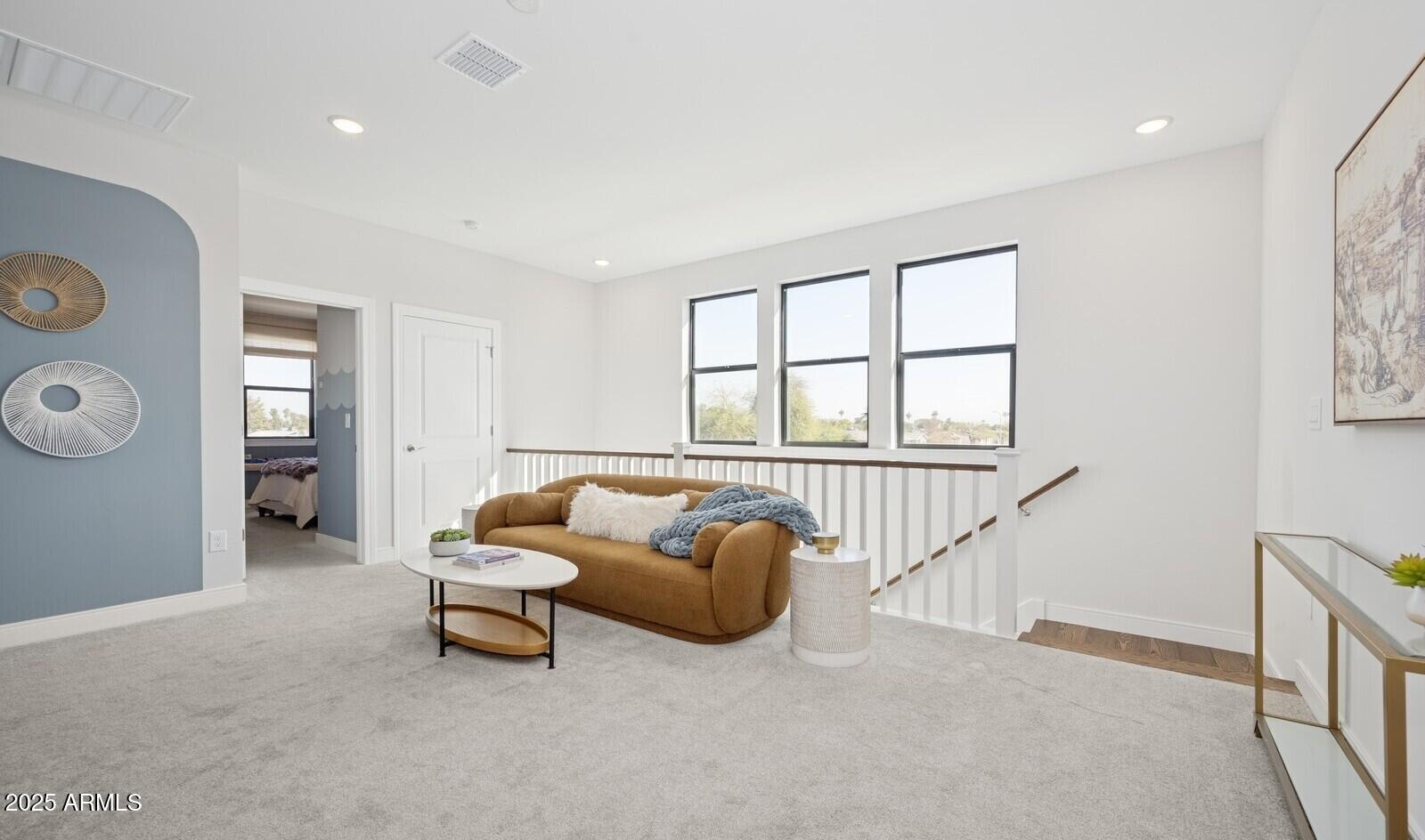 8027 West Royal Palm Road Peoria, AZ 85345 - Photo 17 of 33 a living room with furniture and a window
