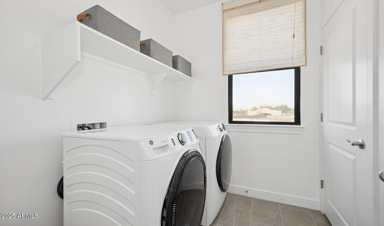 8027 West Royal Palm Road Peoria, AZ 85345 - Photo 31 of 33 a utility room with dryer and washer