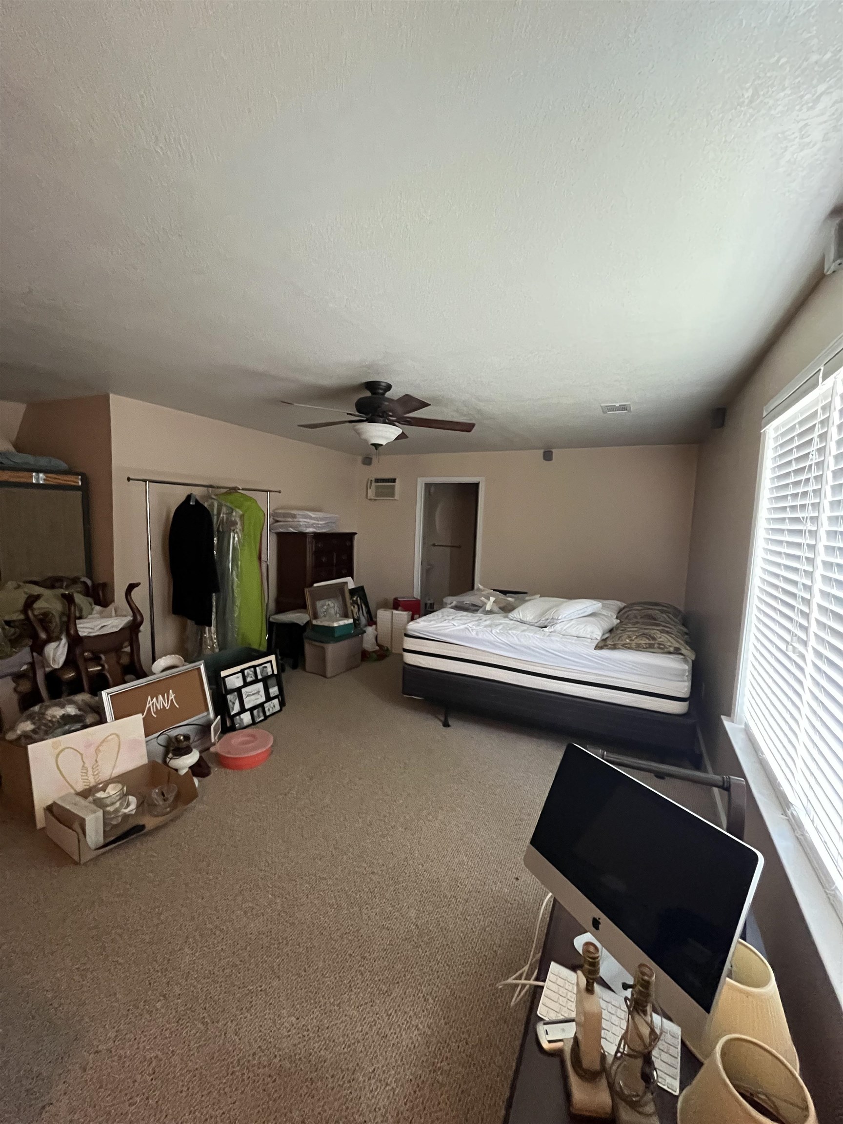 5485 Shipp Road Millington, TN 38053 - Photo 13 of 17 Carpeted bedroom featuring a textured ceiling and ceiling fan
