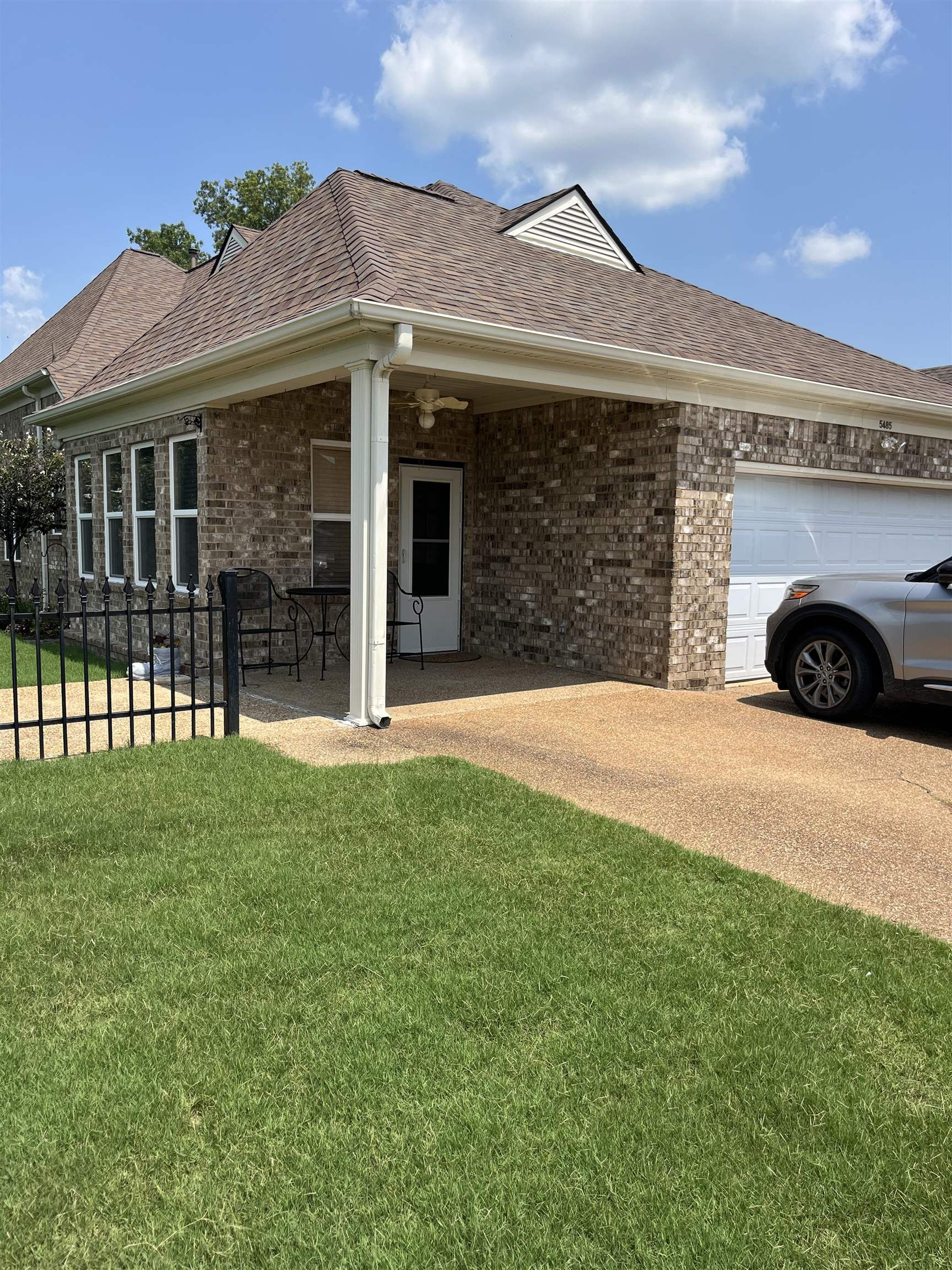 5485 Shipp Road Millington, TN 38053 - Photo 17 of 17 Exterior space featuring a garage and a yard