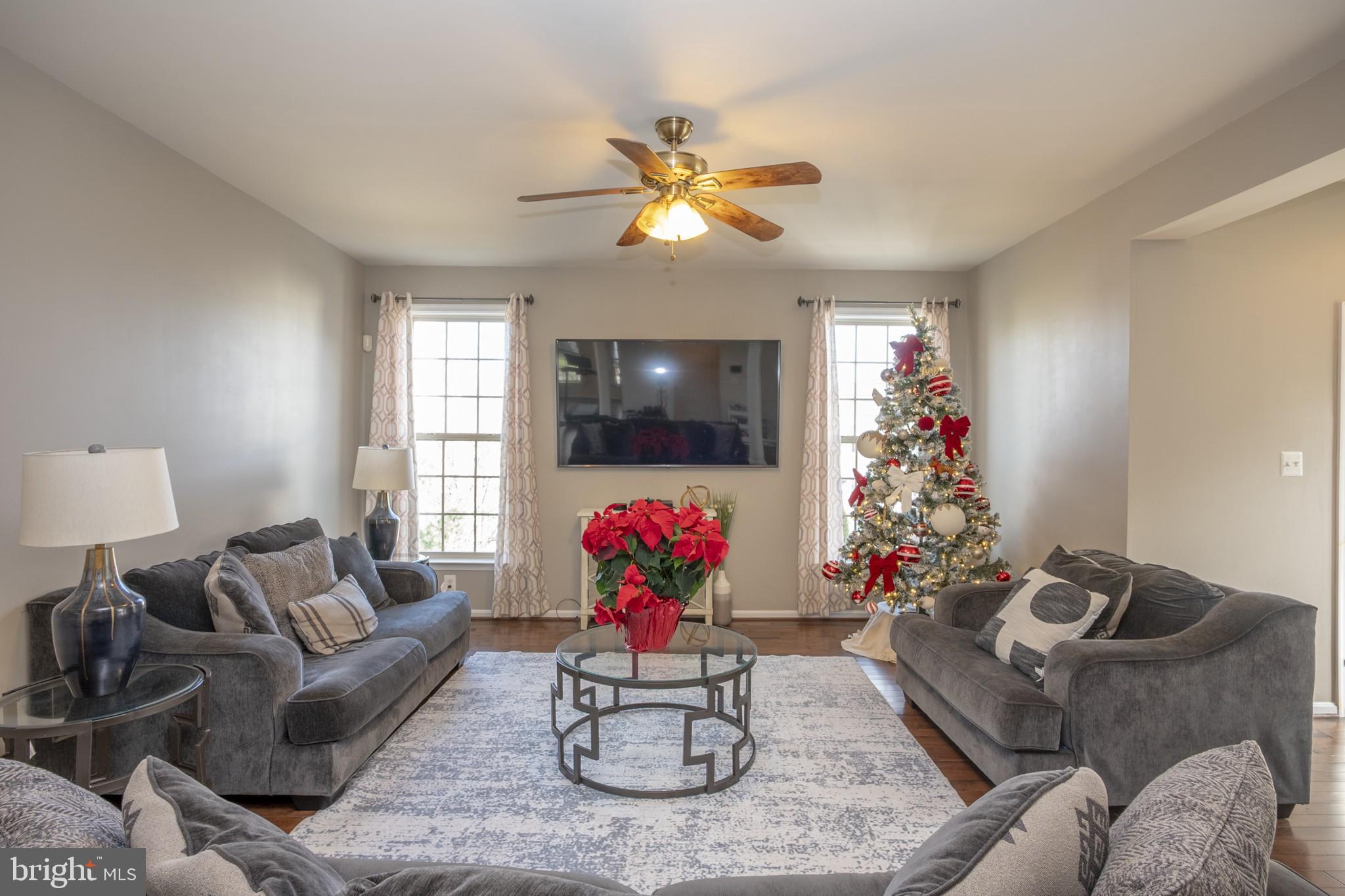 2703 Swann Wing Court Lanham, MD 20706 - Photo 2 of 36 a living room with furniture and window