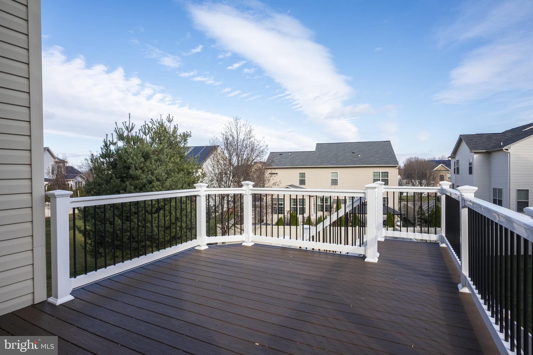 2703 Swann Wing Court Lanham, MD 20706 - Photo 31 of 36 a view of a balcony with wooden floor