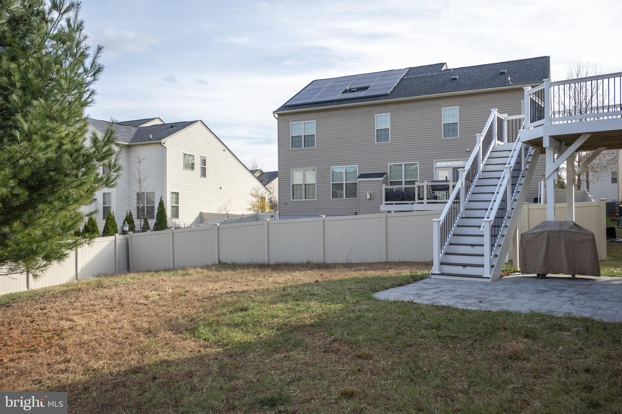 2703 Swann Wing Court Lanham, MD 20706 - Photo 33 of 36 a view of a house with a yard