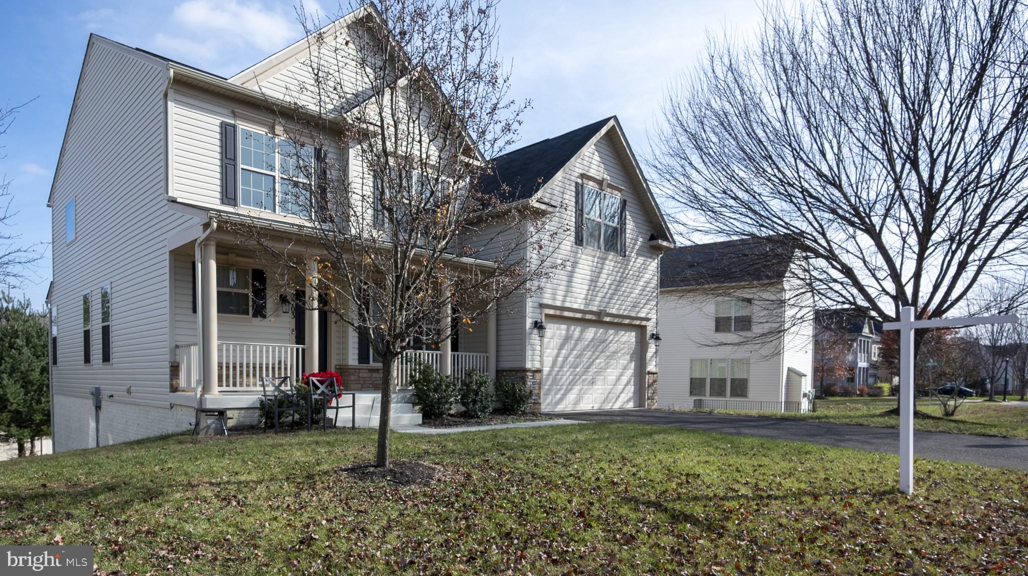 2703 Swann Wing Court Lanham, MD 20706 - Photo 36 of 36 a view of a house with a yard