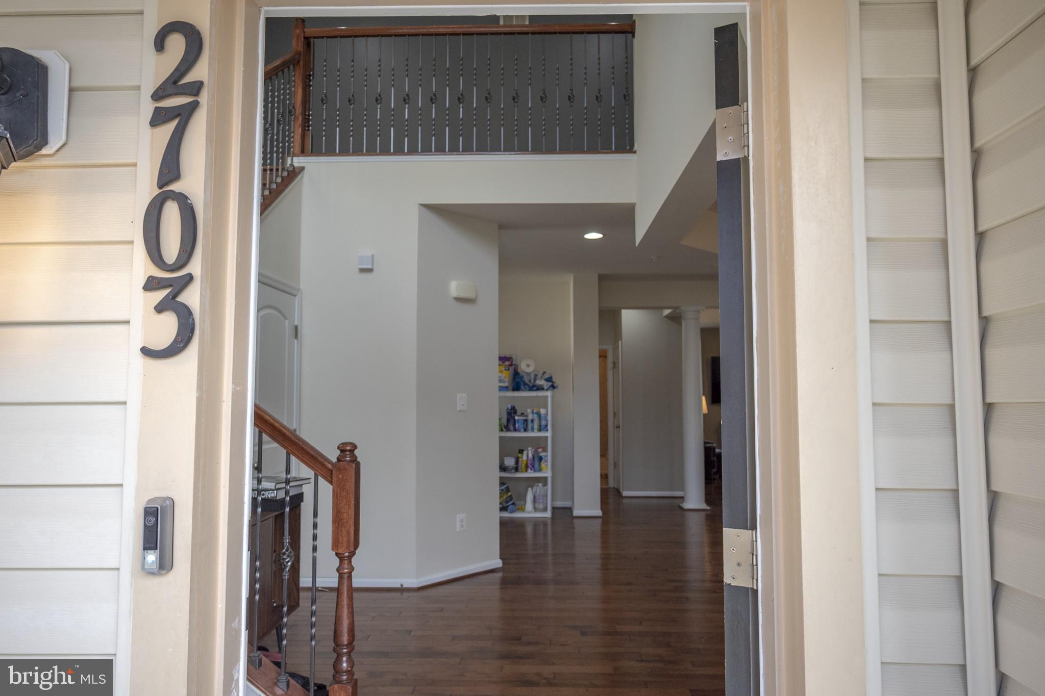 2703 Swann Wing Court Lanham, MD 20706 - Photo 6 of 36 a view of livingroom with hardwood floor and hallway