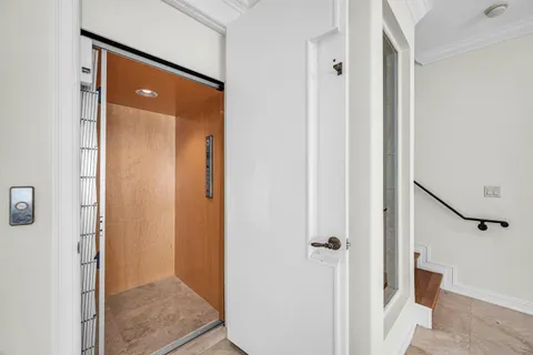 a view of a bathroom with a glass door