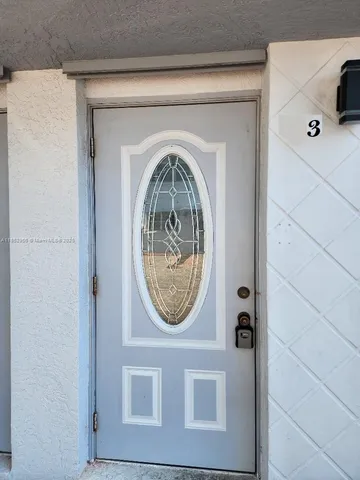 a front view of a house with washer