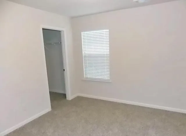 an empty room with windows