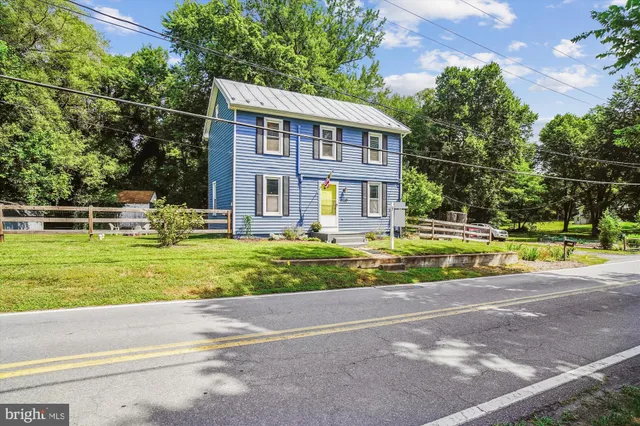 a view of a house with a swimming pool