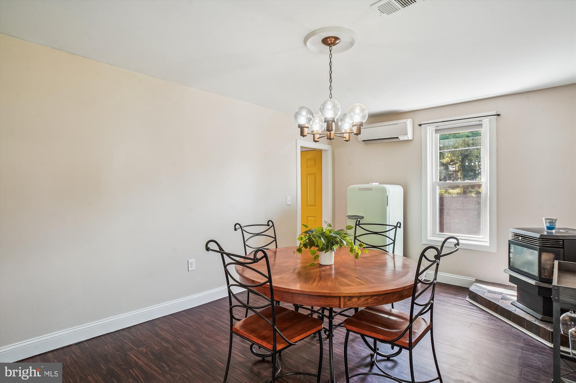 6230 Manor Woods Road Frederick, MD 21703 - Photo 16 of 35 a view of a dining room with furniture and chandelier