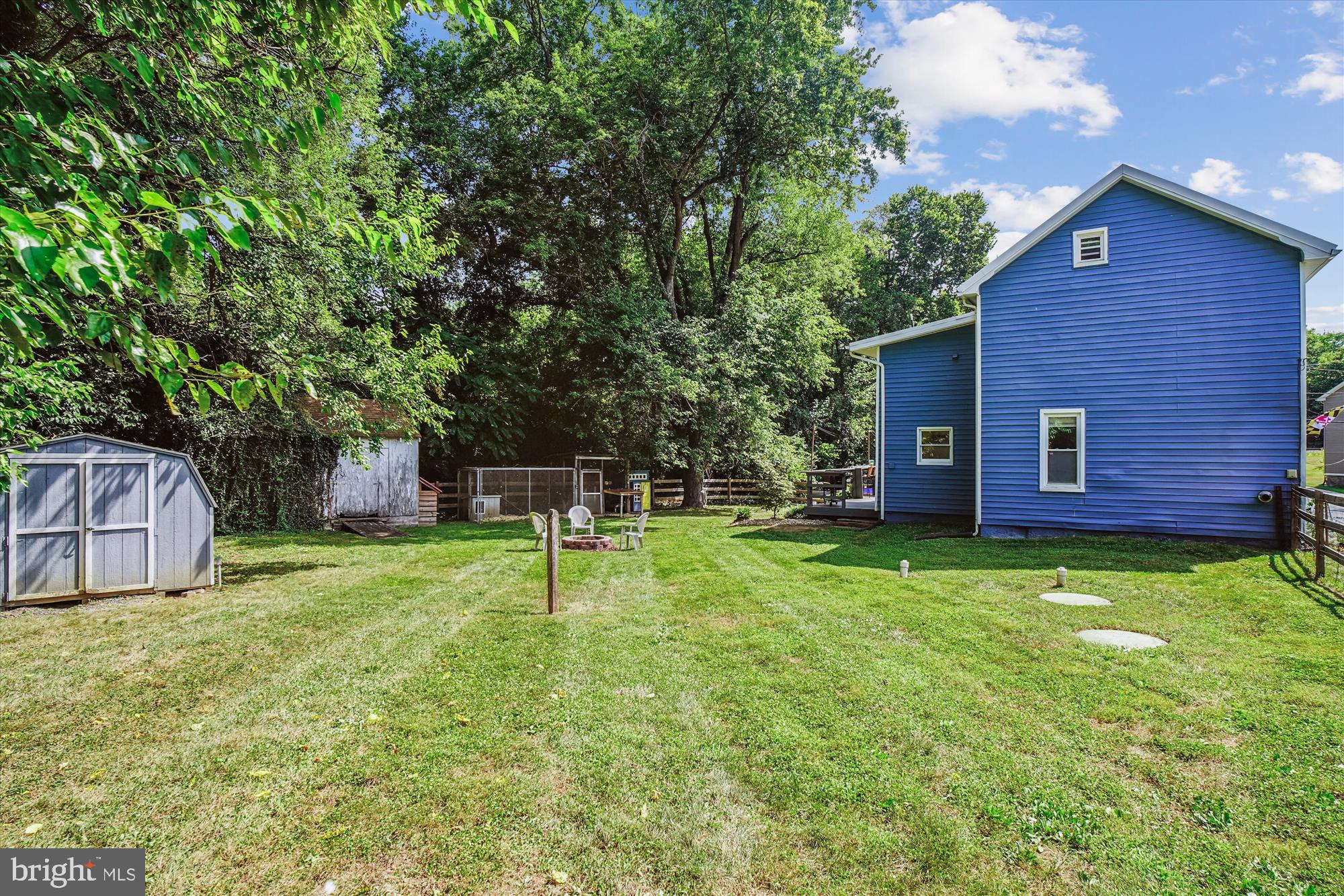 6230 Manor Woods Road Frederick, MD 21703 - Photo 30 of 35 a view of backyard of house with green space