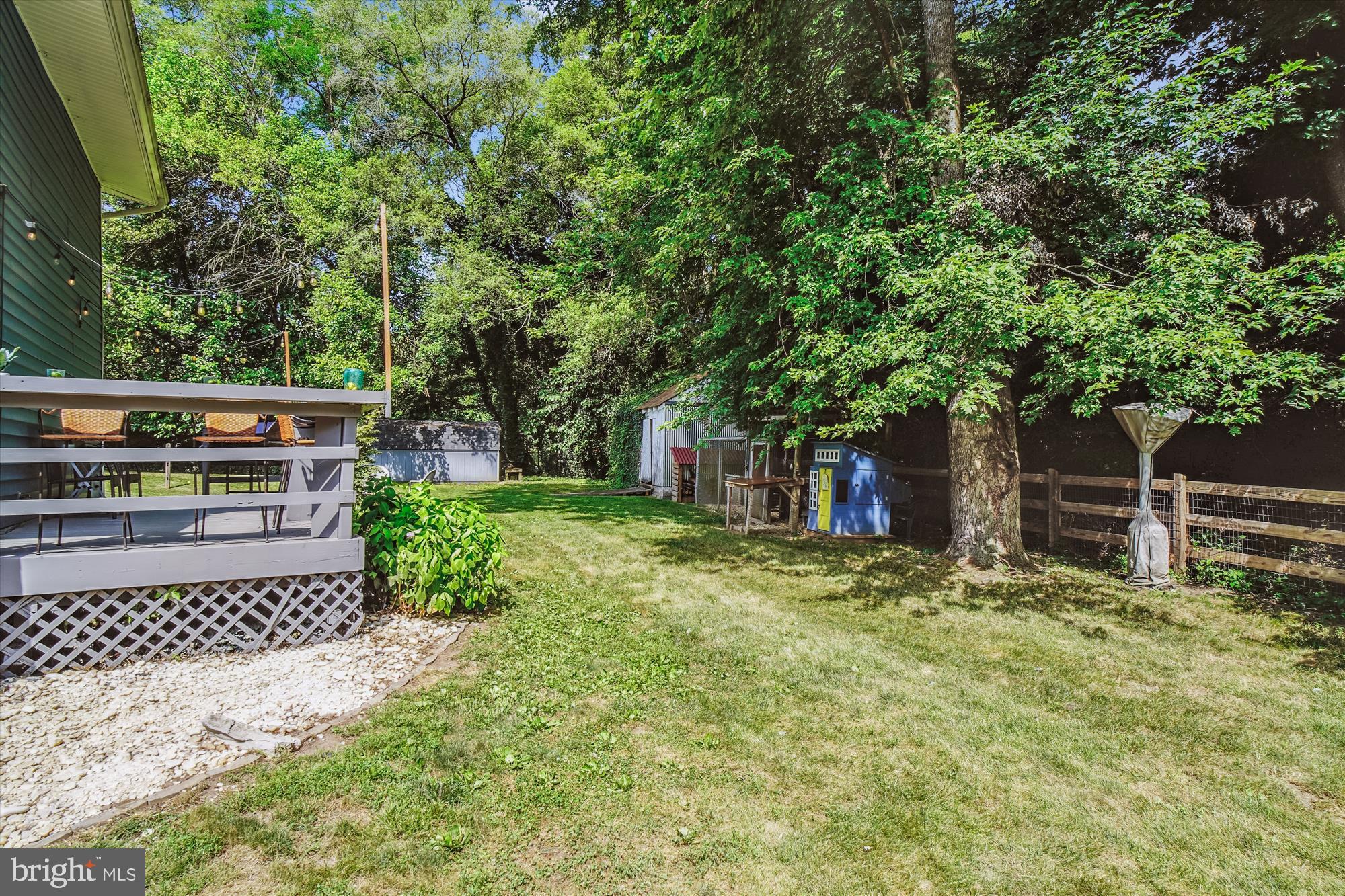 6230 Manor Woods Road Frederick, MD 21703 - Photo 33 of 35 a backyard of a house with lots of green space