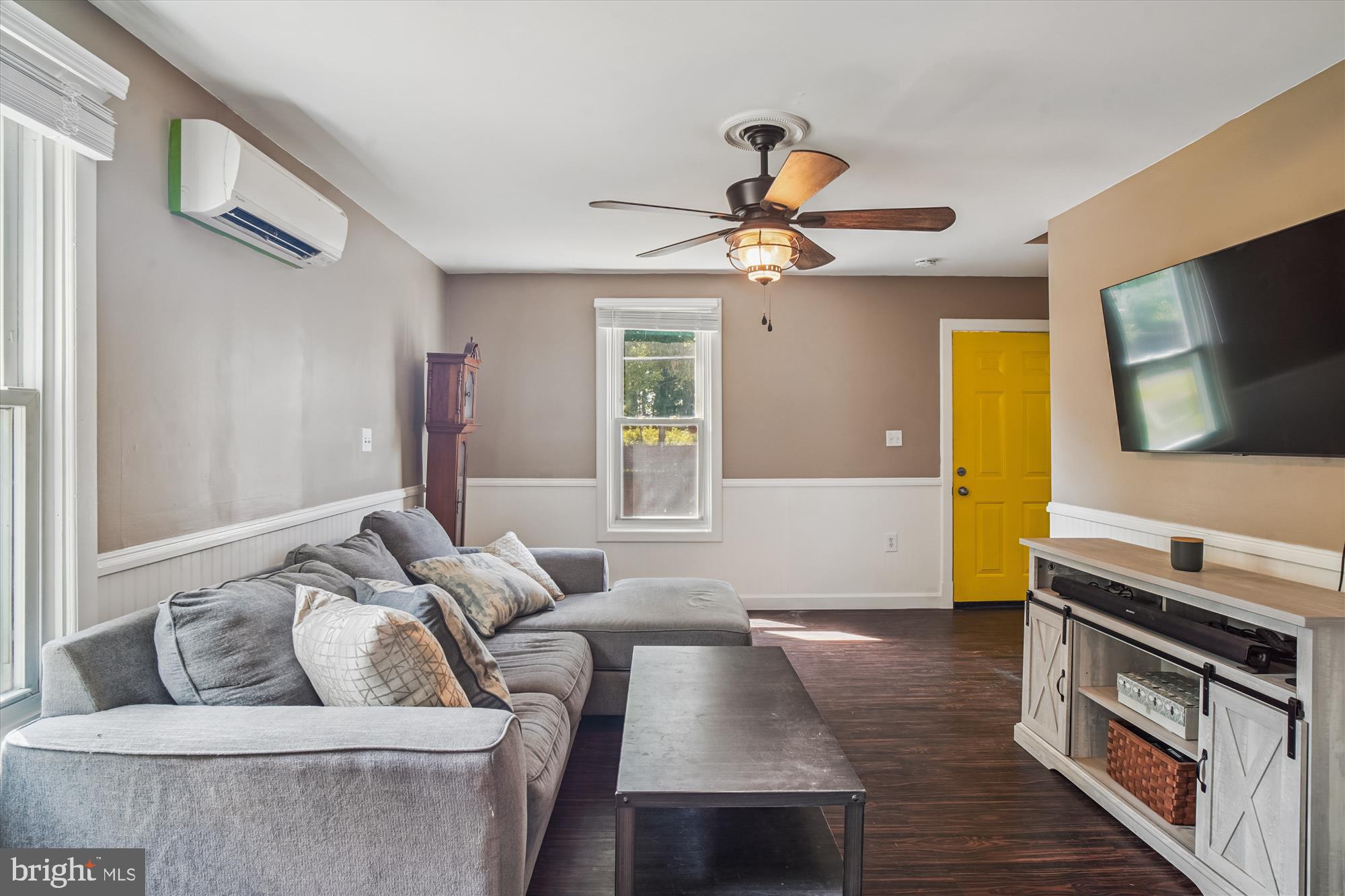 6230 Manor Woods Road Frederick, MD 21703 - Photo 8 of 35 a living room with furniture and a flat screen tv