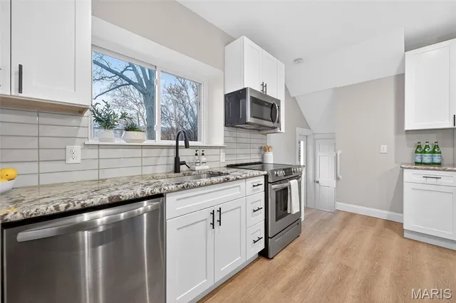 $439,900 | 6810 Pershing Avenue, University City, MO 63130