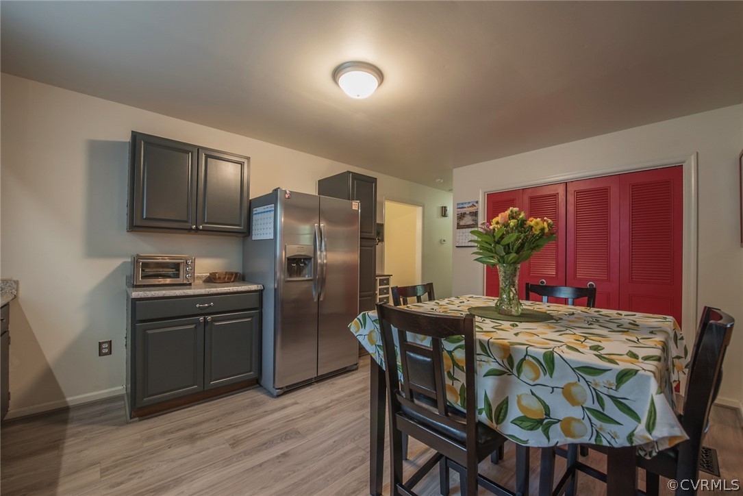 15501 Saddlebrook Road Chesterfield, VA 23838 - Photo 13 of 44 a dining room with furniture and wooden floor