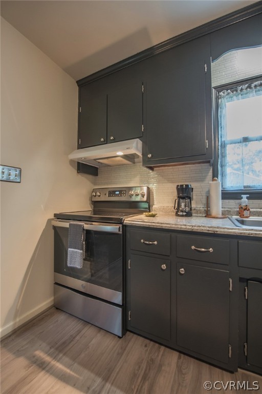 15501 Saddlebrook Road Chesterfield, VA 23838 - Photo 17 of 44 a kitchen with granite countertop a stove and a sink