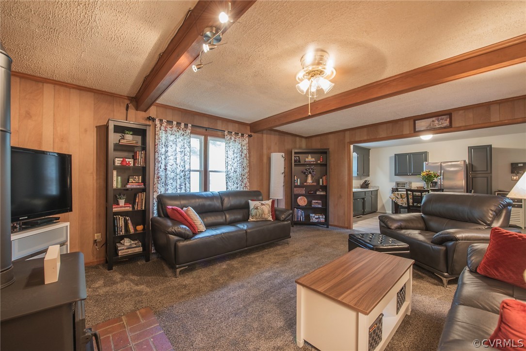 15501 Saddlebrook Road Chesterfield, VA 23838 - Photo 21 of 44 a living room with furniture and a flat screen tv