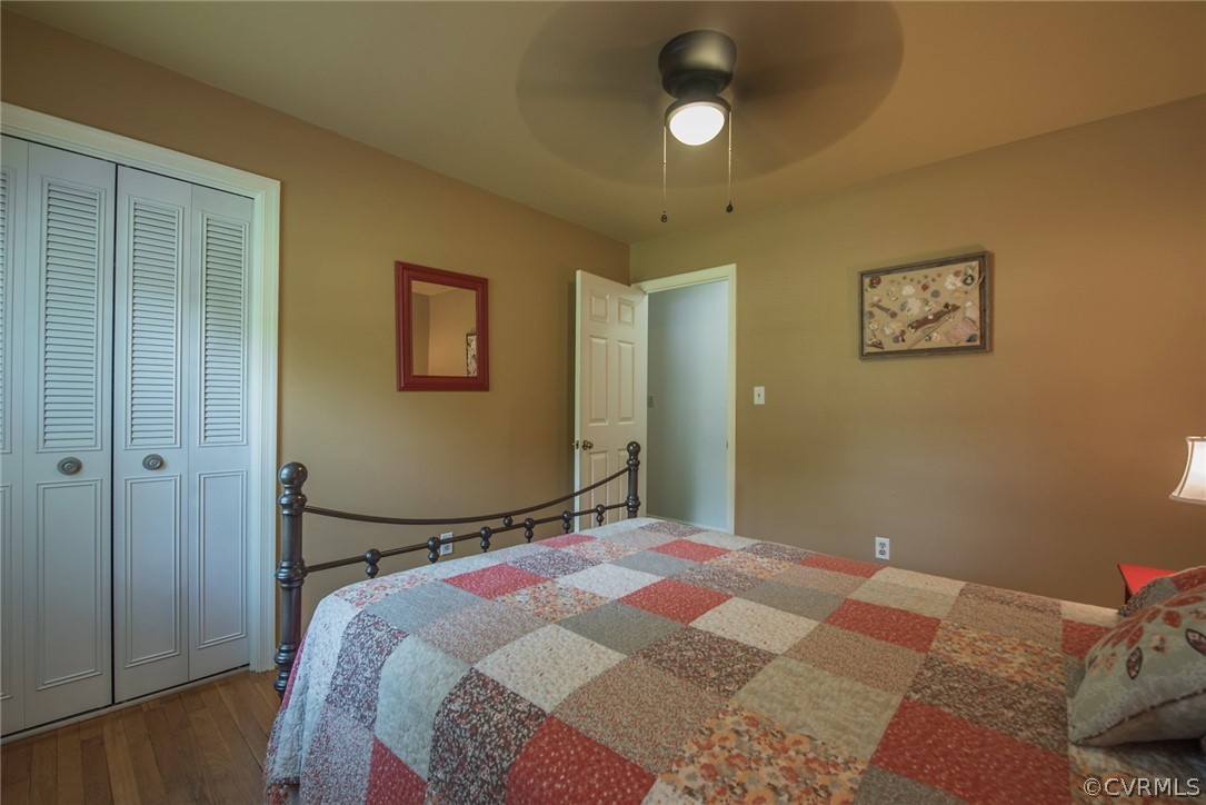 15501 Saddlebrook Road Chesterfield, VA 23838 - Photo 23 of 44 a bedroom with a bed and a painting on the wall