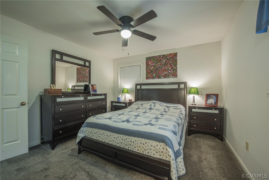 15501 Saddlebrook Road Chesterfield, VA 23838 - Photo 29 of 44 a bedroom with a bed and a dresser