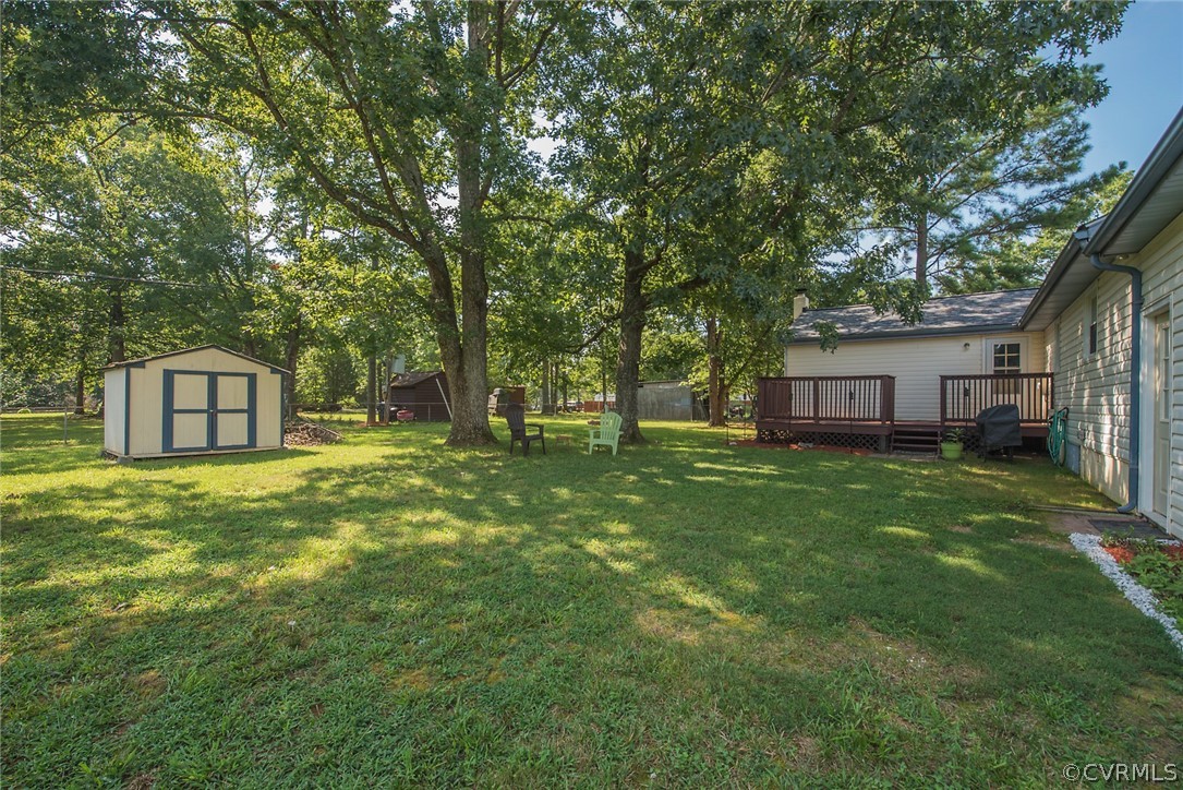 15501 Saddlebrook Road Chesterfield, VA 23838 - Photo 34 of 44 a front view of a house with a garden