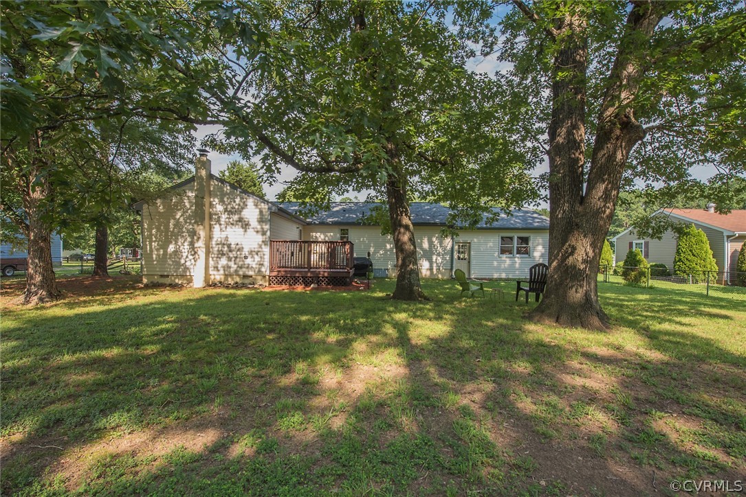 15501 Saddlebrook Road Chesterfield, VA 23838 - Photo 40 of 44 a view of a yard in front of a house with a large tree