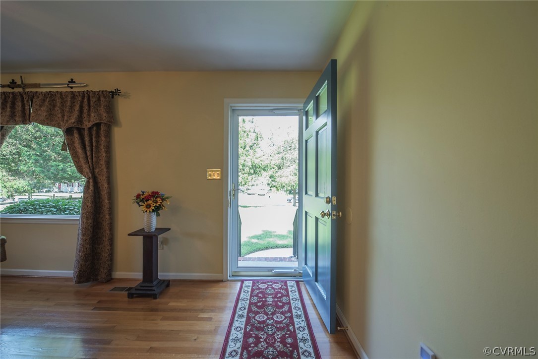 15501 Saddlebrook Road Chesterfield, VA 23838 - Photo 4 of 44 a view of hallway with wooden floor and stairs