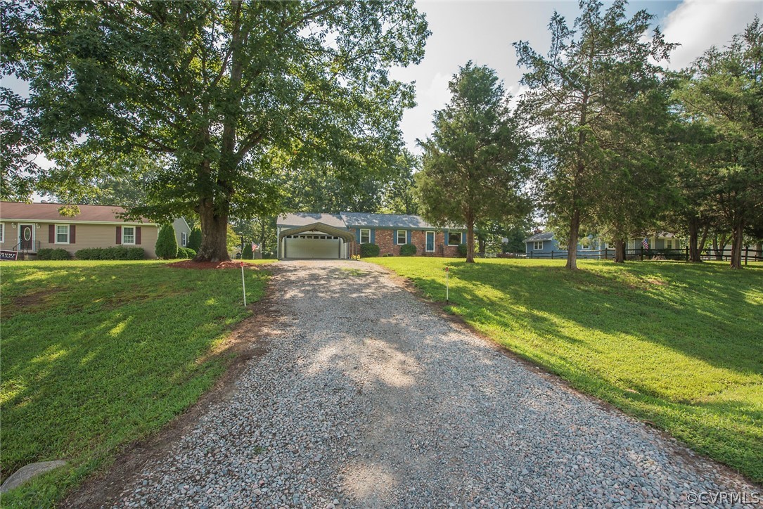 15501 Saddlebrook Road Chesterfield, VA 23838 - Photo 43 of 44 a view of a house with a yard