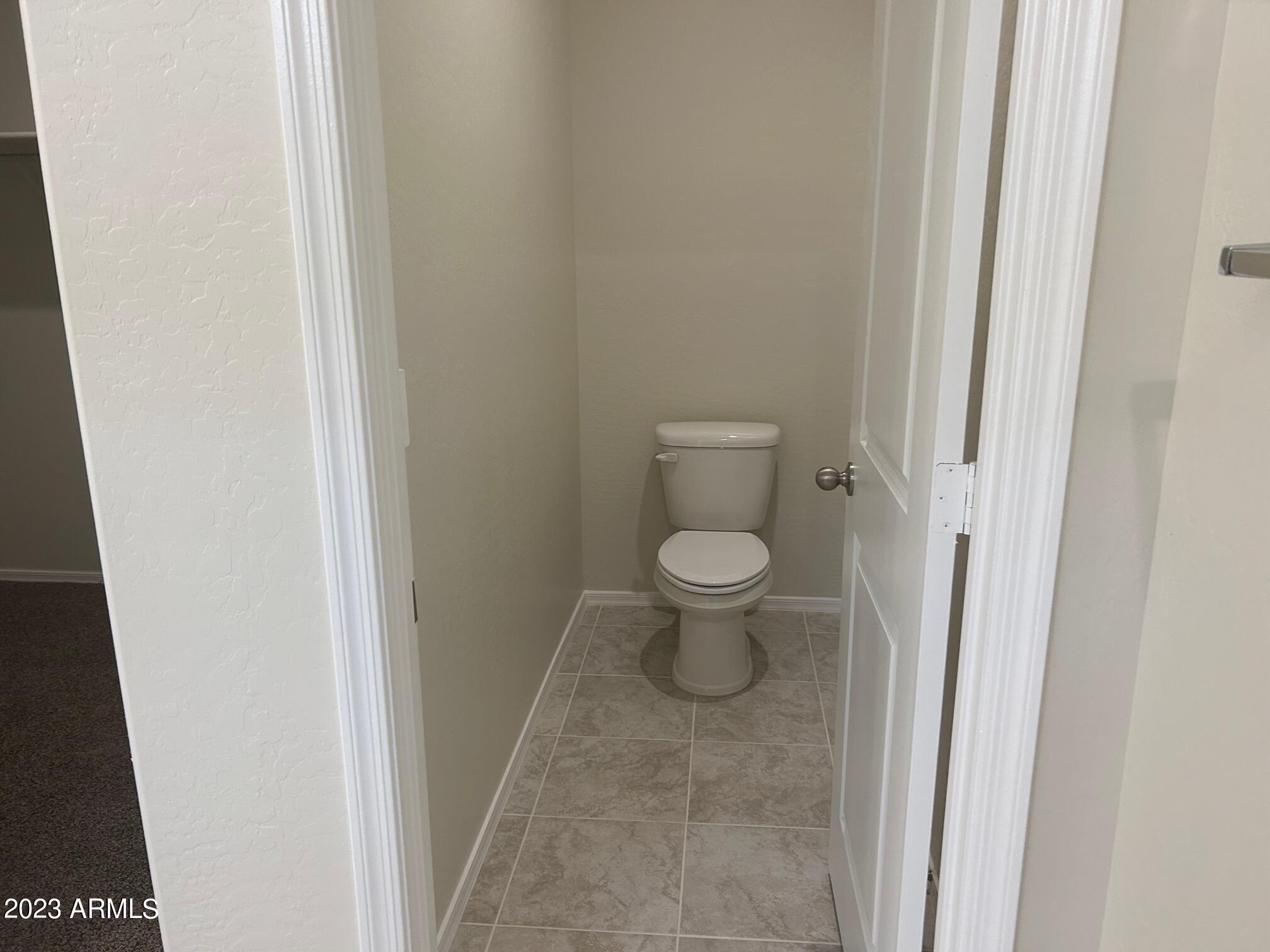 5119 East Emery Road San Tan Valley, AZ 85143 - Photo 11 of 19 a view of a bathroom with a sink