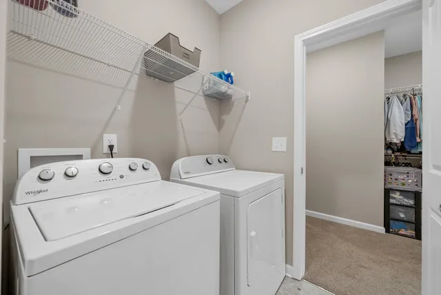 a view of a house with a large window and a table