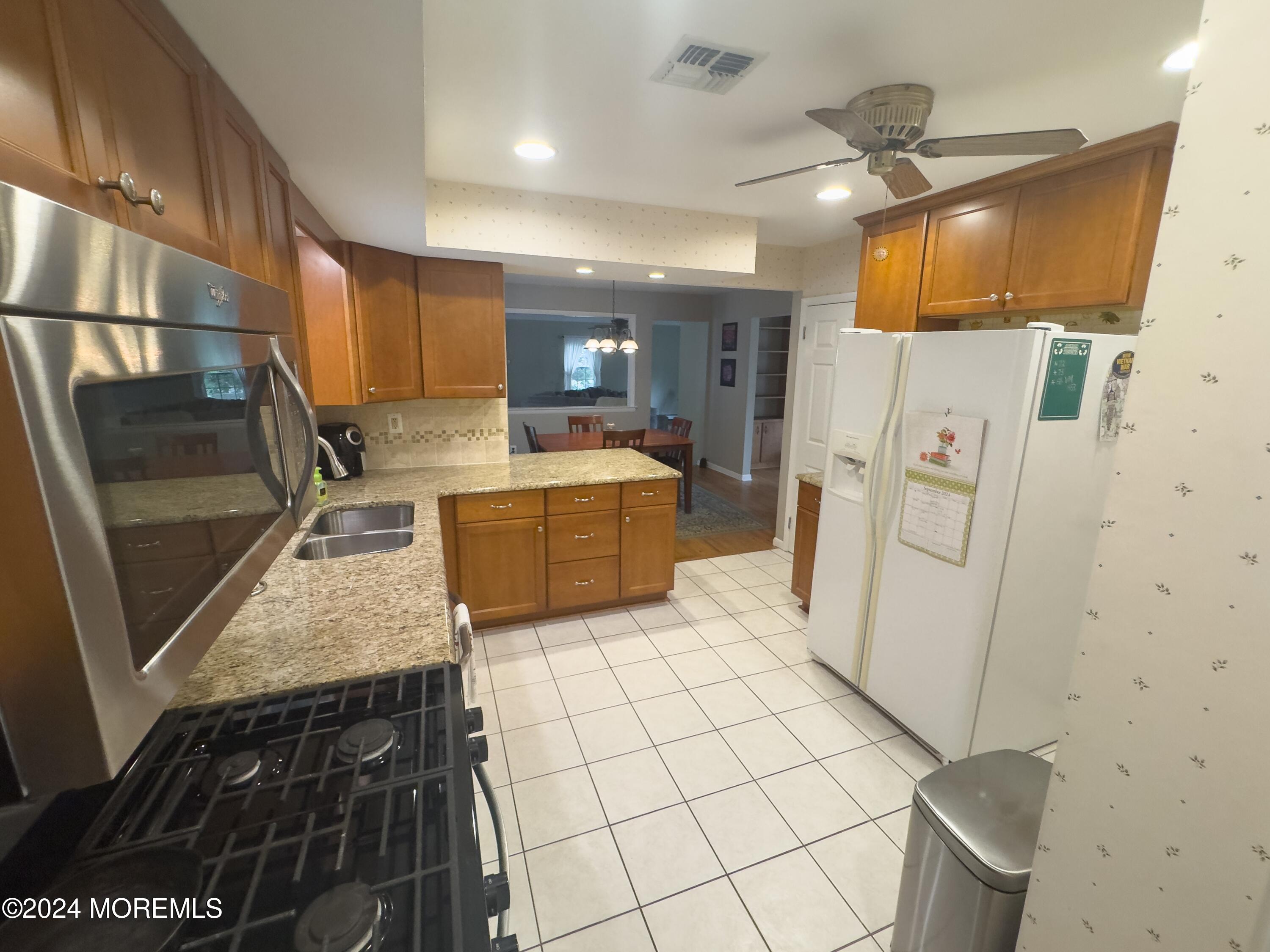 56 Toms River Road Jackson, NJ 08527 - Photo 23 of 58 56 Toms River Kitchen to Family