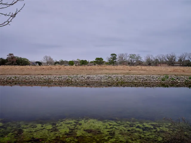 a view of a lake with a house