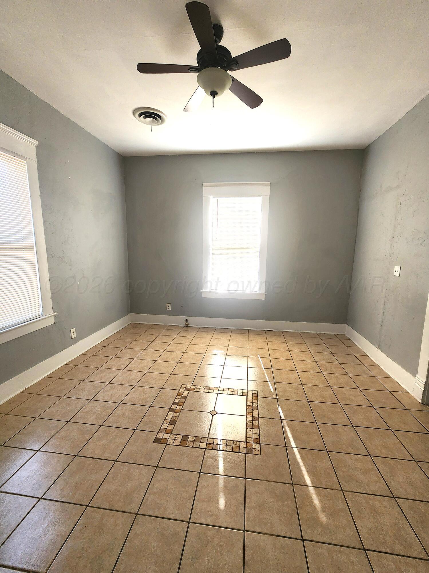 1108 South Lincoln Street Amarillo, TX 79101 - Photo 18 of 25 a view of an empty room and window